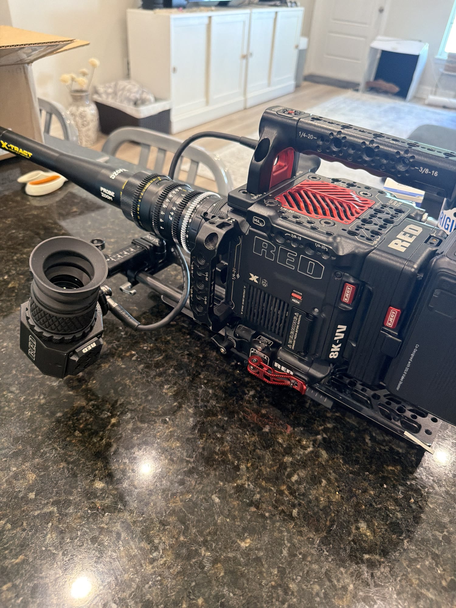 The probe lens mounted on the cinema camera, its focus, zoom and rotation rings stacked along the barrel.